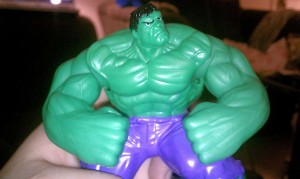 I got Hulk here in my Happy Meal. Press a button on his back and he smashes things, such as walnuts. This makes him much more functional than the Littlest Pet Shop "cat" (they all look alike to me) in my last Happy Meal.
